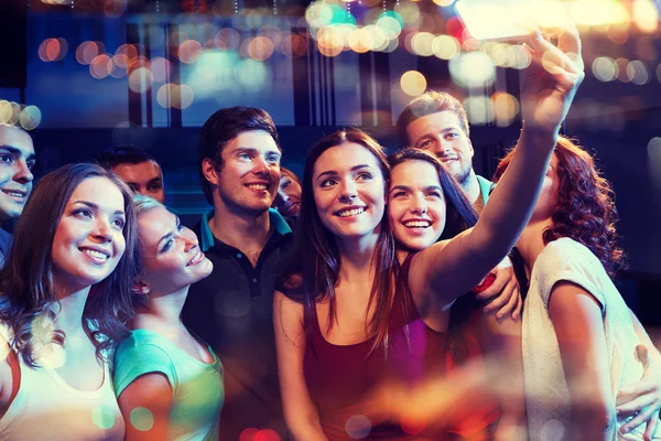 Depositphotos 105632782 Stock Photo Friends With Smartphone Taking Selfie1